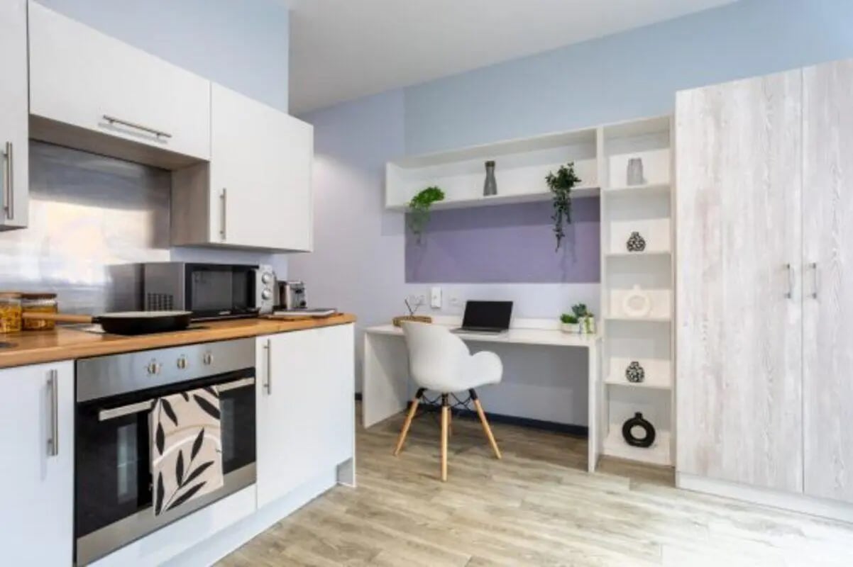 Kitchen with desk study area and wardrobe kitchen area at dwell Archer House in Nottingham Student Accommodation