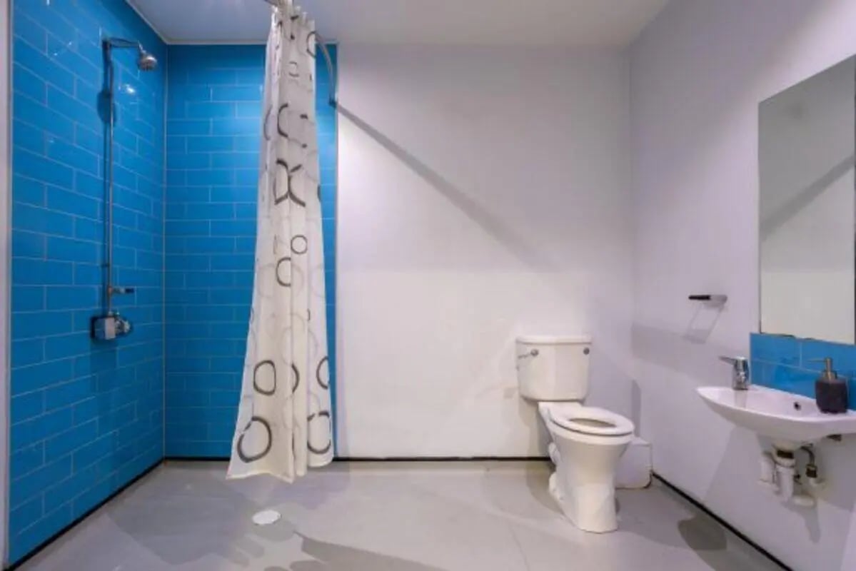 Shower toilet sink with mirror Bathroom at dwell Archer House in Nottingham Student Accommodation