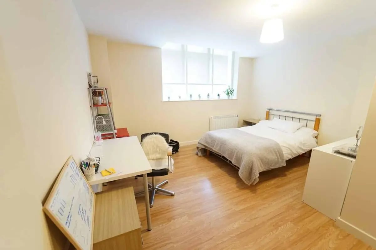 Bed desk shelf whiteboard chair dresser bedroom at dwell Castle Gate Haus in Nottingham Student Accommodation