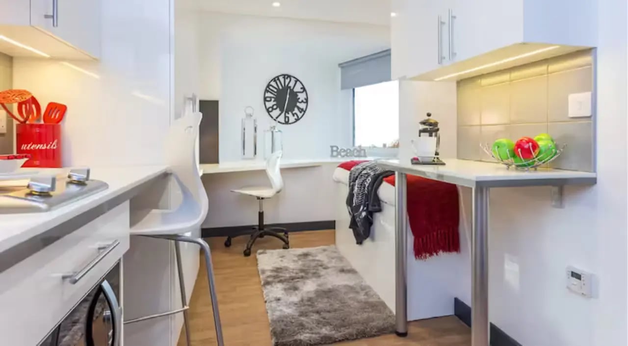 Kitchenette area with red utensils and fruit bowl Kitchen Area at The Court Yard in Southampton Student Accommodation