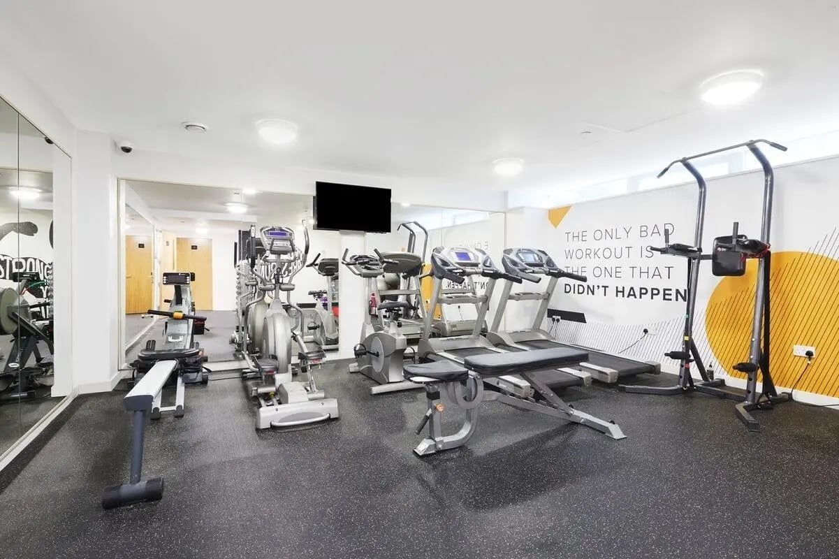 Gym equipment treadmills elliptical rower pull-up bar gym at Collegiate Park House in Southampton Student Accommodation