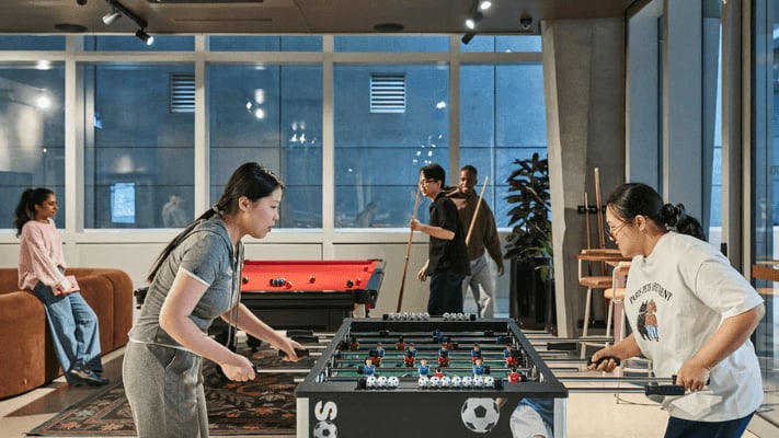 Foosball and pool table games area common room at UniLodge Melbourne Flagstaff in Melbourne Student Accommodation