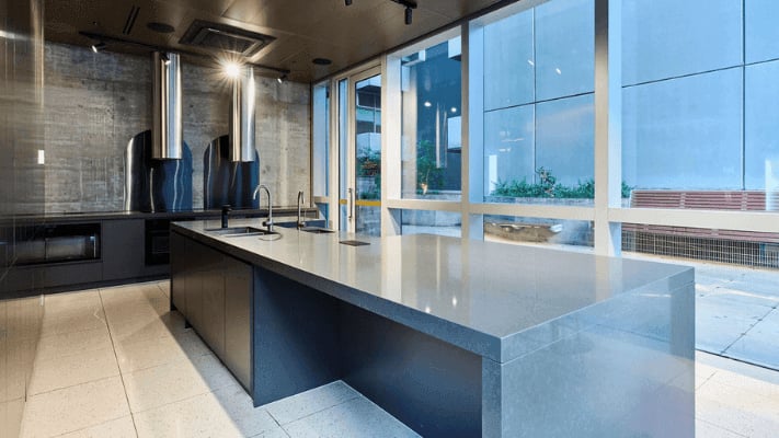 Modern island sink with stainless steel appliances kitchen at UniLodge Melbourne Flagstaff in Melbourne Student Accommodation