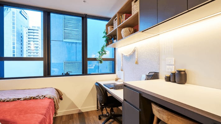 Bed desk shelving modern student bedroom at UniLodge Melbourne Flagstaff in Melbourne Student Accommodation