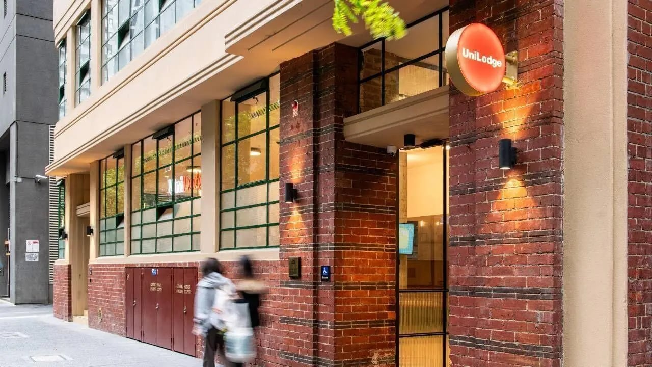 Brick building with UniLodge sign exterior at UniLodge Melbourne Flagstaff in Melbourne Student Accommodation