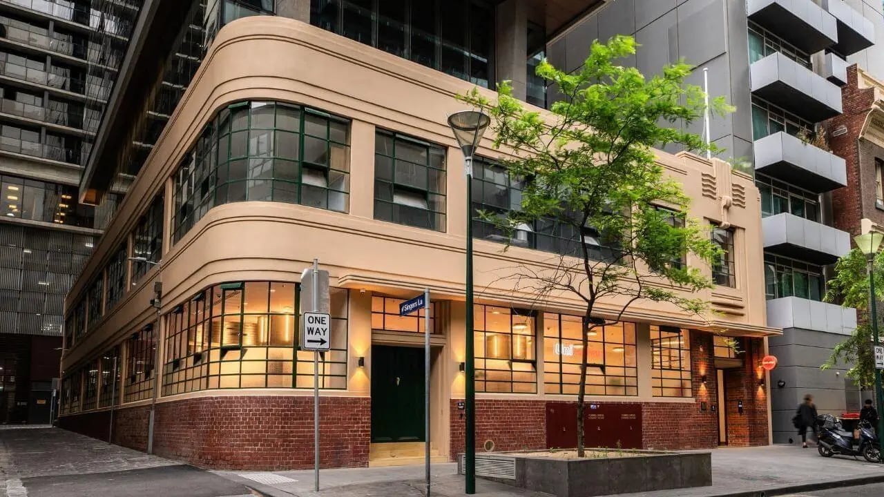 Art deco building with large windows exterior at UniLodge Melbourne Flagstaff in Melbourne Student Accommodation