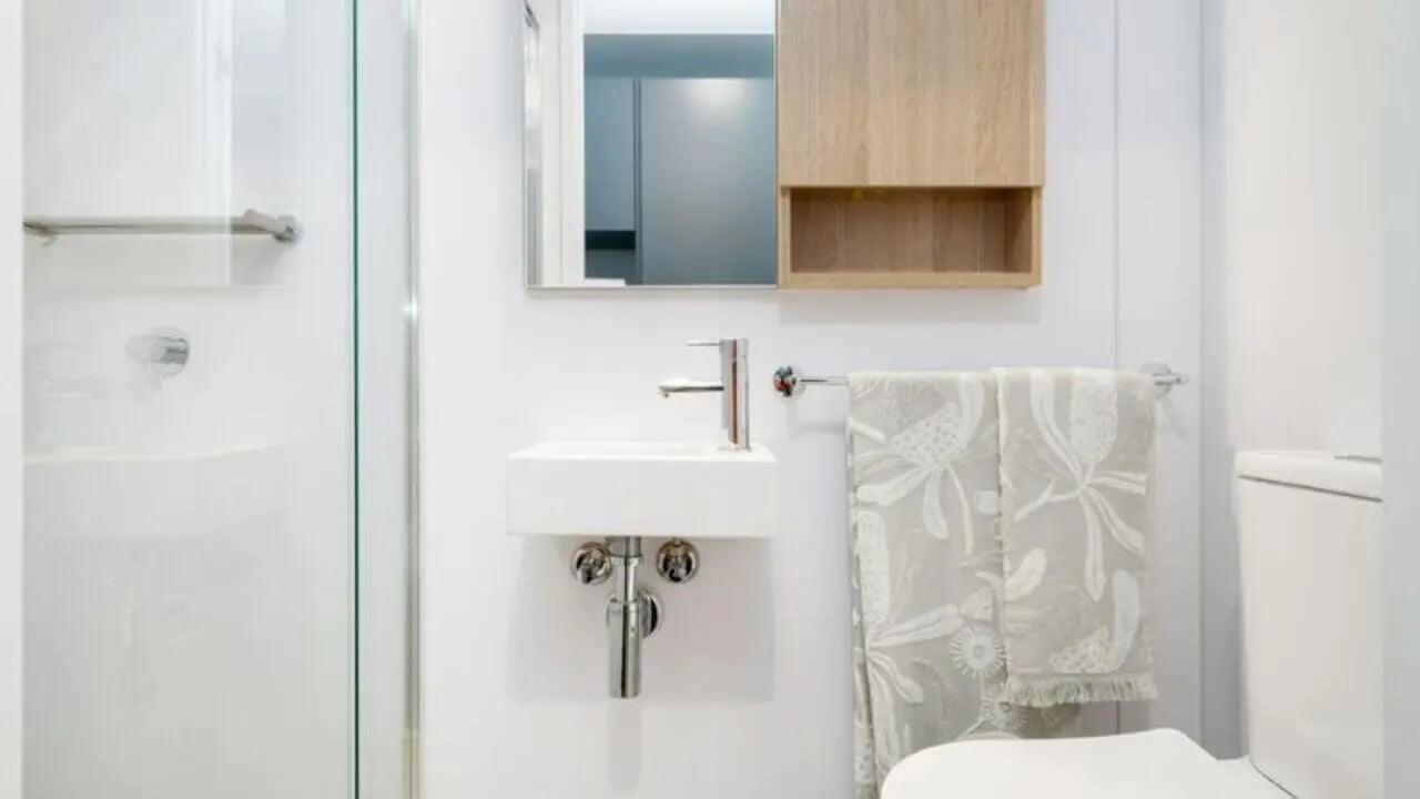 Shower sink towels and toilet bathroom at UniLodge Melbourne Central in Melbourne Student Accommodation