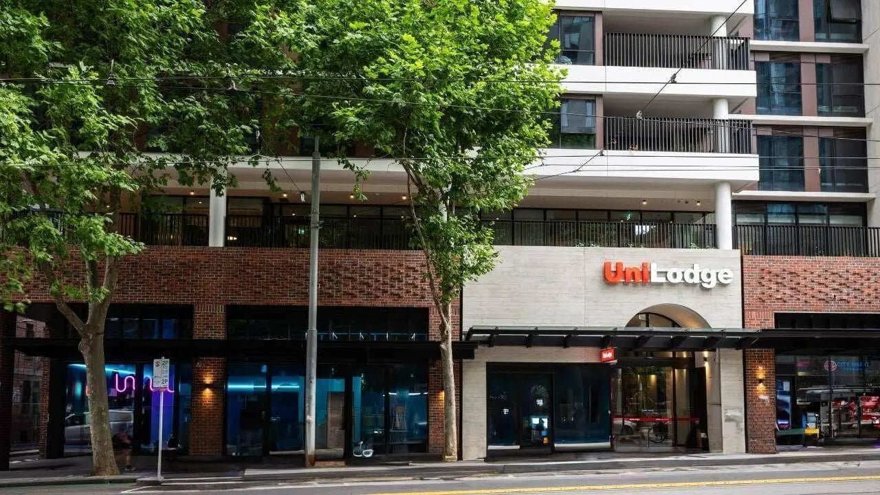 UniLodge building entrance with trees exterior at UniLodge Melbourne Central in Melbourne Student Accommodation