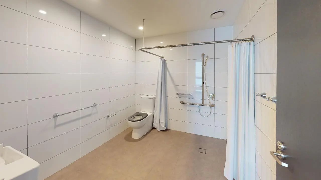 Toilet shower and sink with grab bars bathroom at Unilodge Melbourne City in Melbourne Student Accommodation
