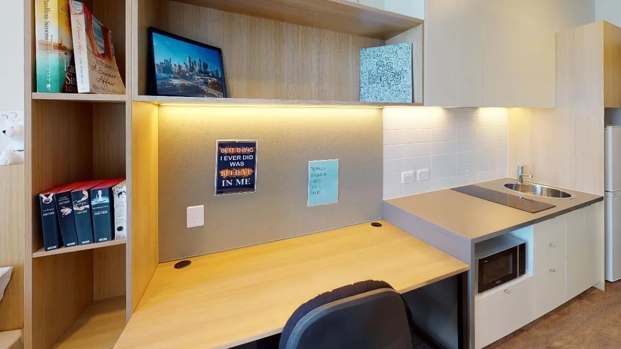 Desk with microwave sink and kitchen studio at Unilodge Melbourne City in Melbourne Student Accommodation