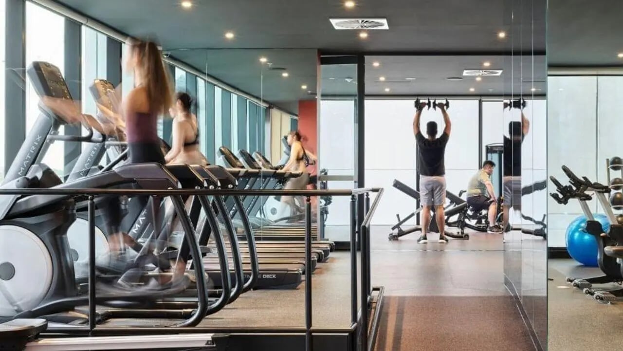 Treadmills weight benches and exercise bikes gym at Unilodge Melbourne City in Melbourne Student Accommodation