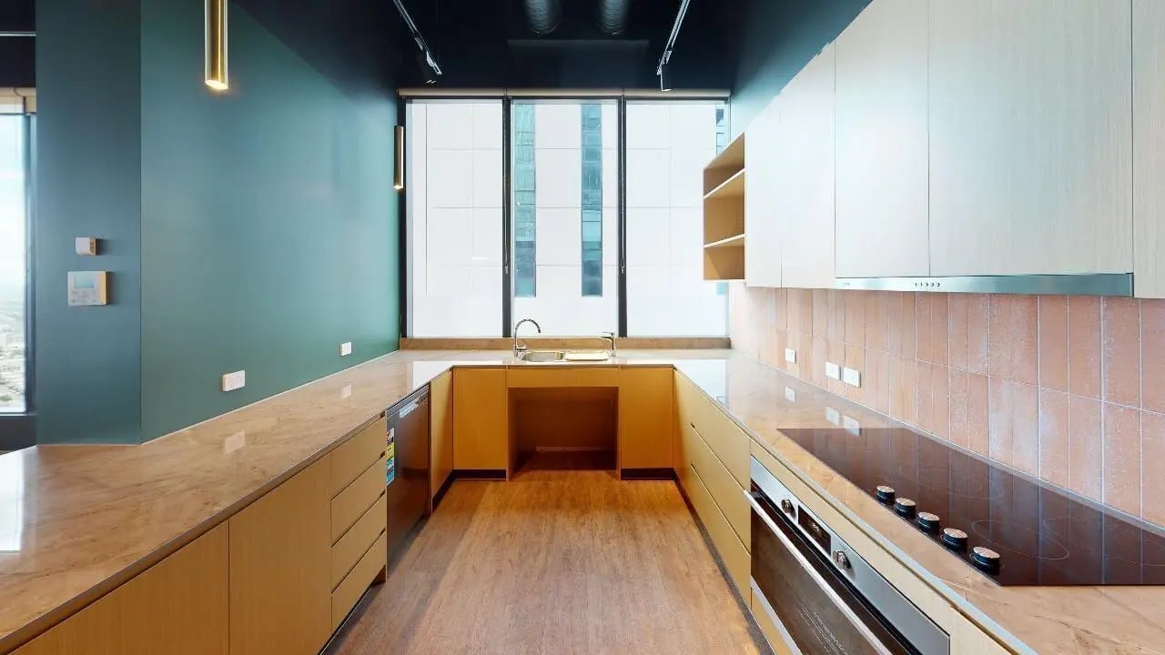 Modern kitchen with island and large window Kitchen at Unilodge Melbourne City in Melbourne Student Accommodation
