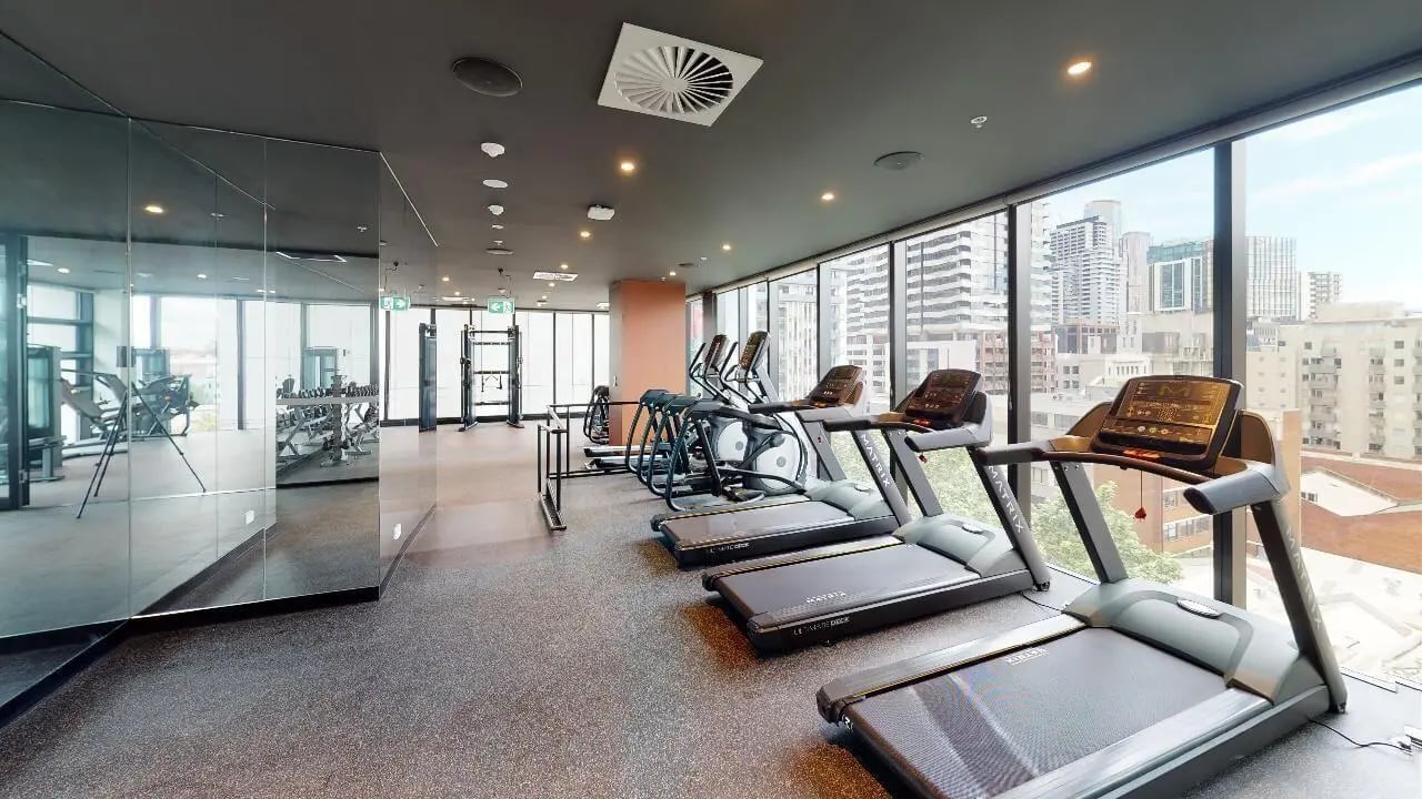 Treadmills elliptical machines gym equipment fitness room at Unilodge Melbourne City in Melbourne Student Accommodation