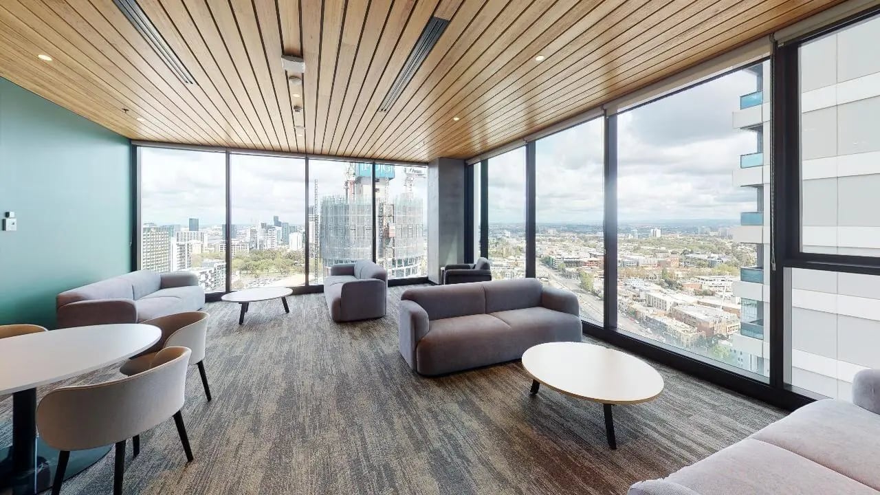 Sofas tables and chairs living room at Unilodge Melbourne City in Melbourne Student Accommodation