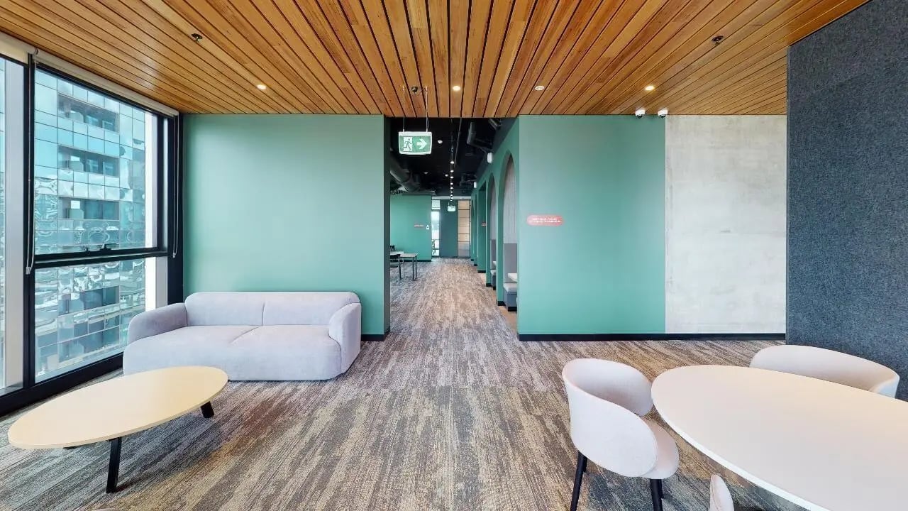 Sofa tables and chairs in common area at Unilodge Melbourne City in Melbourne Student Accommodation