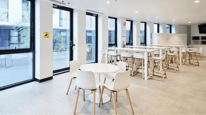 White round table and chairs high tables study area at UniLodge Park Avenue in Melbourne Student Accommodation