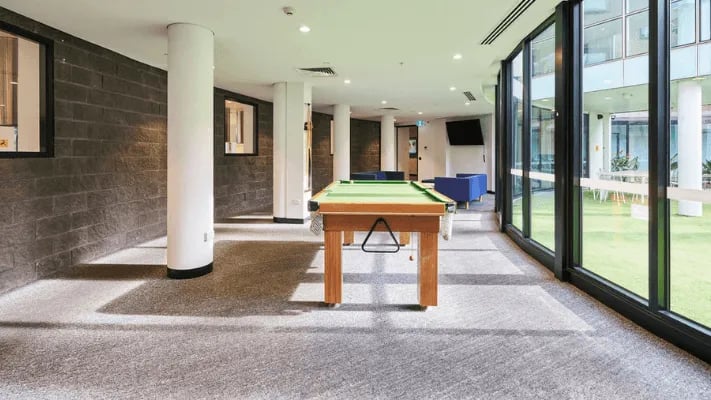 Pool table and seating area lounge at UniLodge Park Avenue in Melbourne Student Accommodation