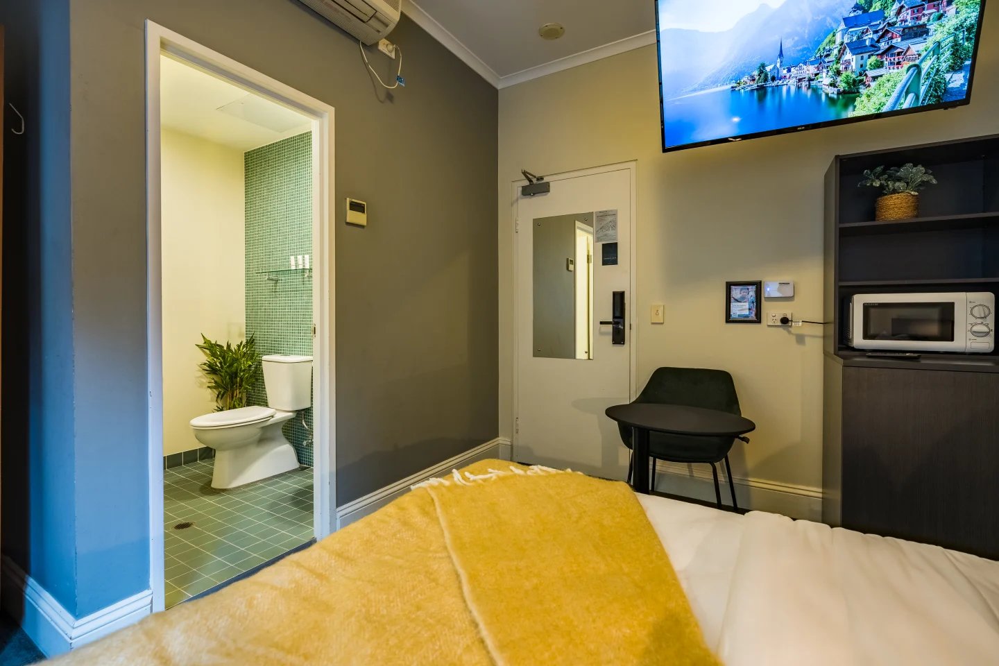 Bed bathroom toilet and microwave bedroom at ume Haymarket in Sydney Student Accommodation