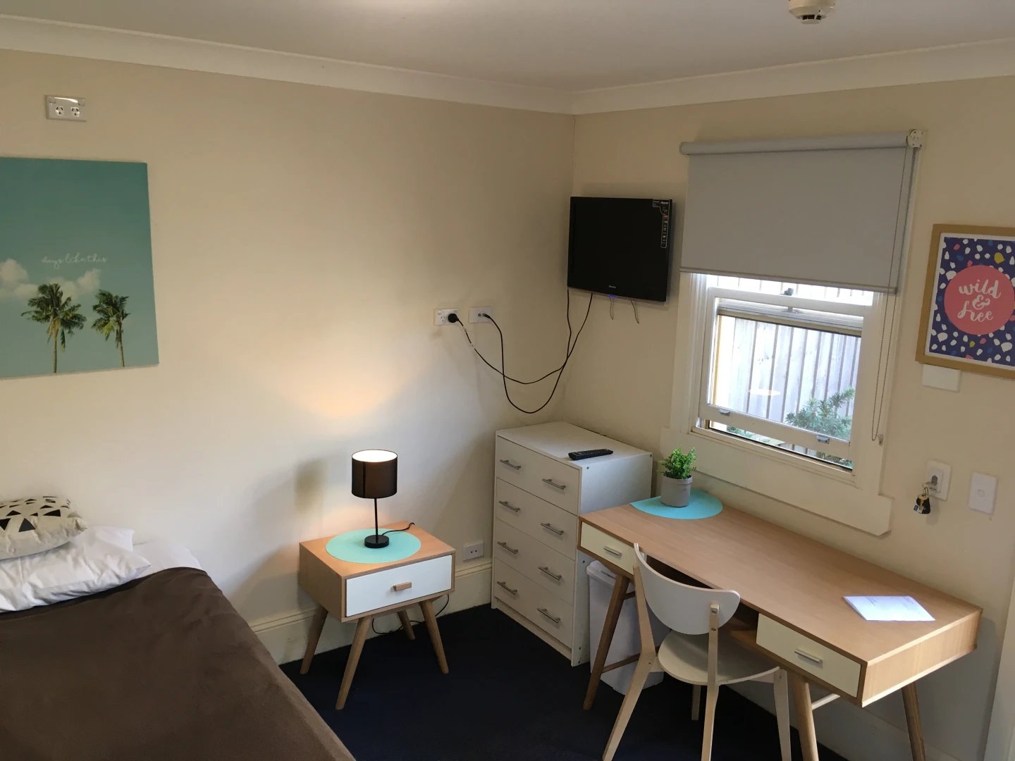 Bed desk lamp dresser window wall art bedroom at ume Redfern in Sydney Student Accommodation