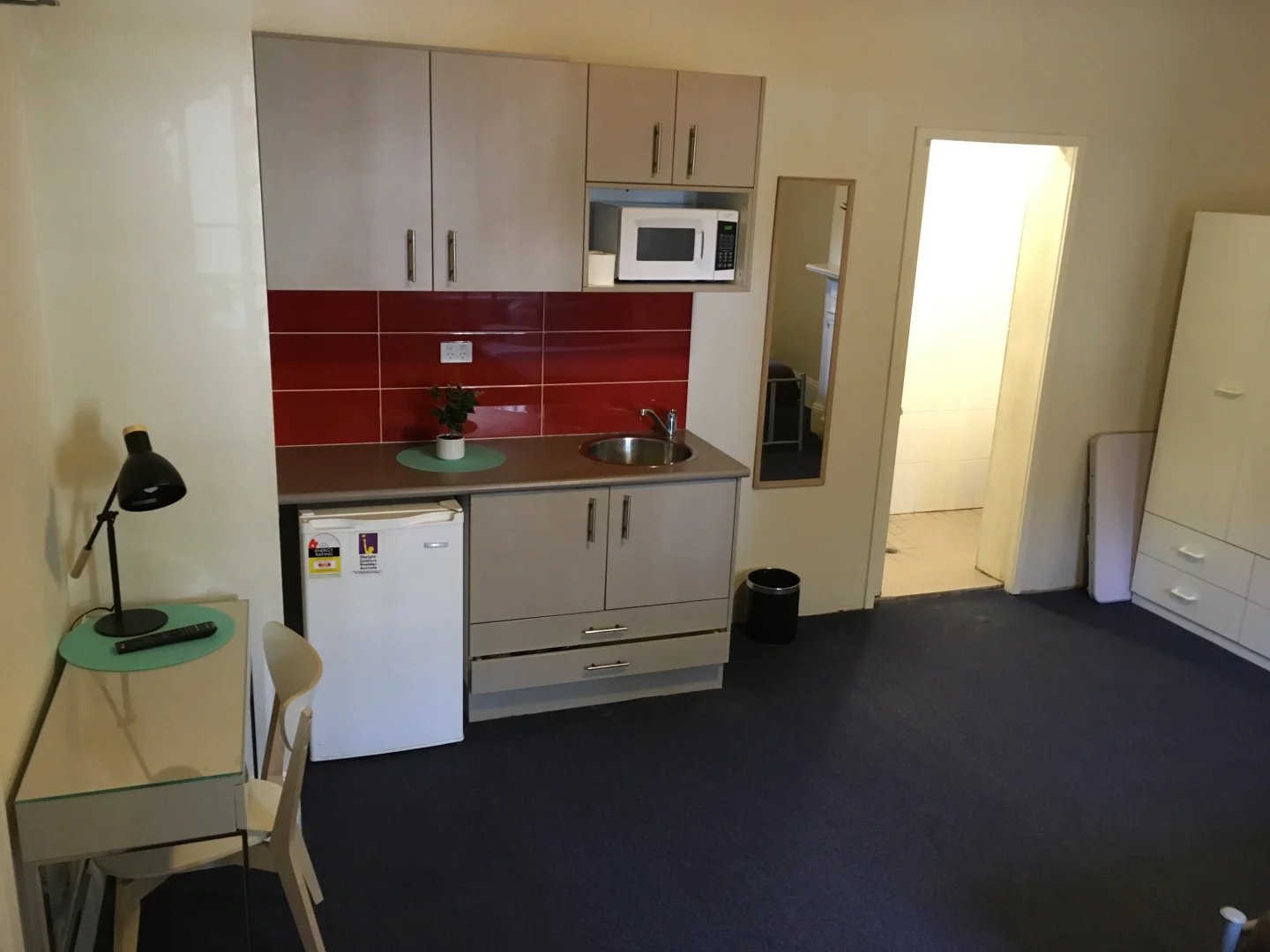 Desk lamp mini fridge microwave kitchen area at ume Redfern in Sydney Student Accommodation