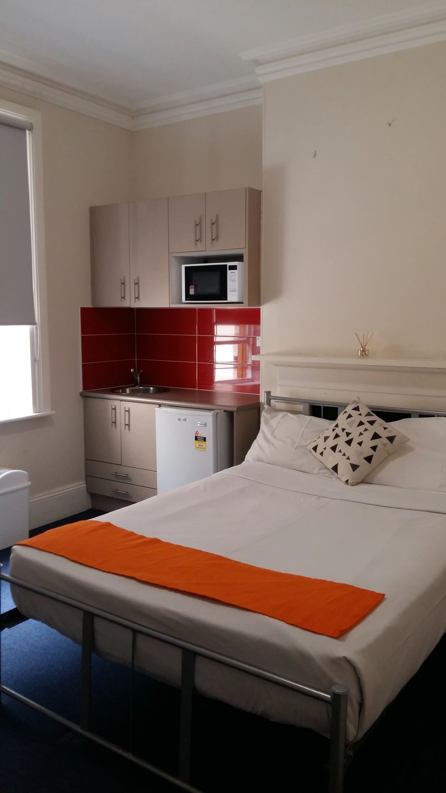 Bed microwave mini-fridge sink kitchen bedroom at ume Redfern in Sydney Student Accommodation