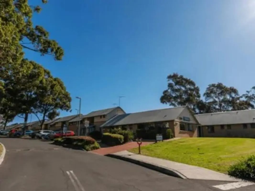 Low-rise buildings with surrounding greenery exterior at Western Sydney University Campbelltown Village in Sydney Student Accommodation