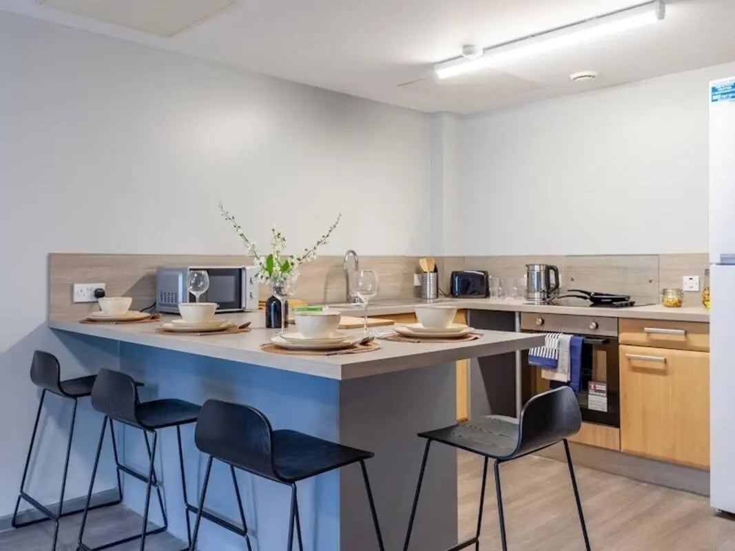 Microwave counter seating and appliances kitchen at Filbert Village in Leicester Student Accommodation