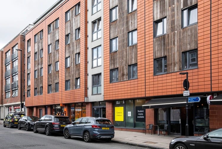 Student rooms available sign and cars exterior at Piccadilly Court in London Student Accommodation