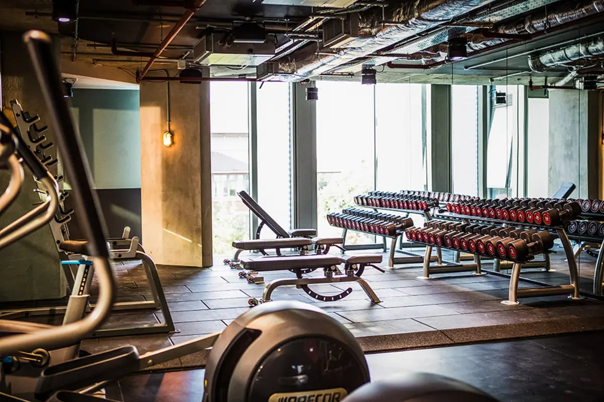 Dumbbells benches exercise machines gym area at Chapter Kings Cross in London Student Accommodation