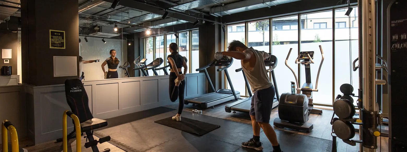Treadmills ellipticals and weight machine gym at The Valentine London in London Student Accommodation