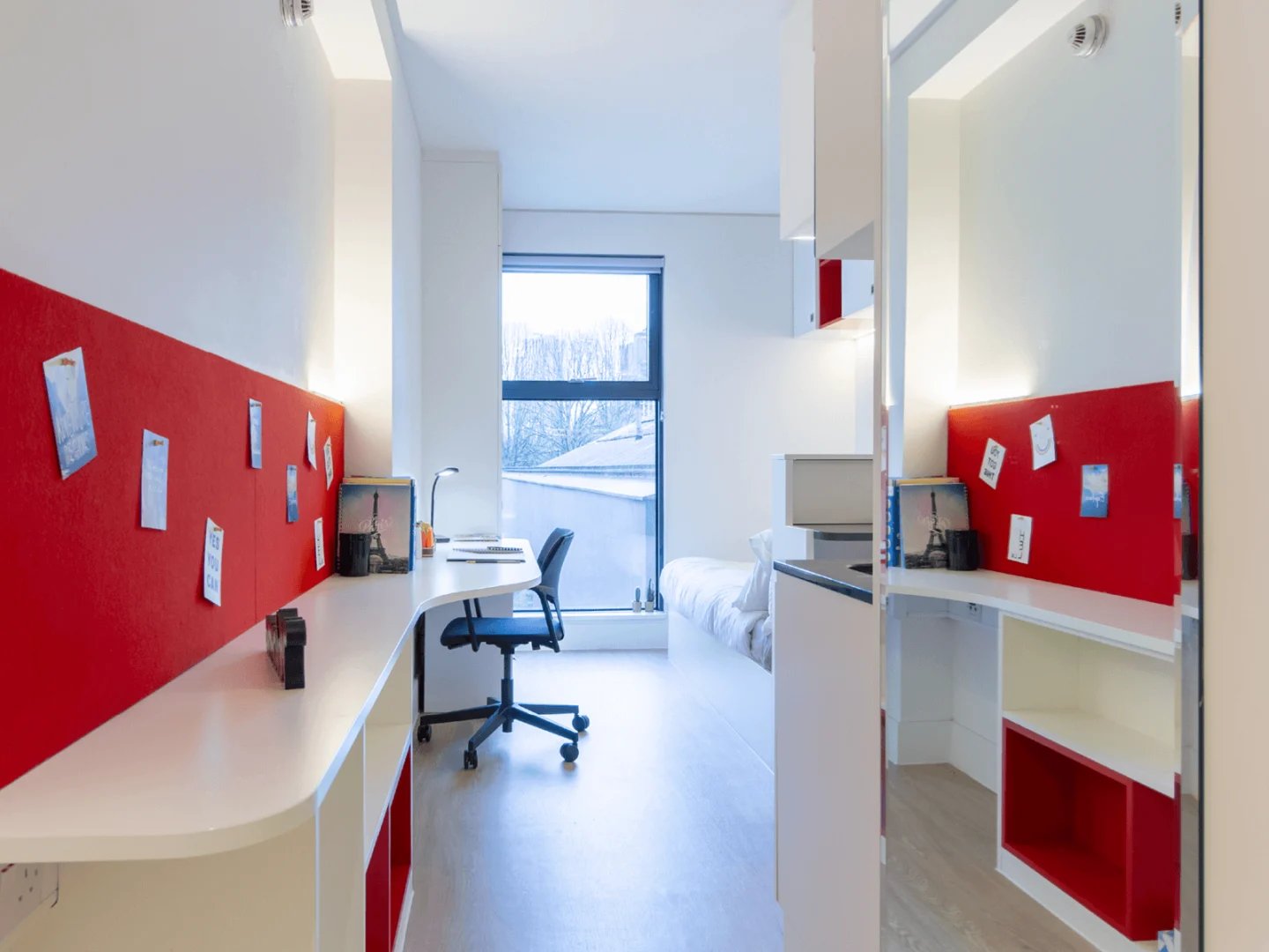 Desk chair and bed in modern accommodation study area at Spring Mews in London Student Accommodation