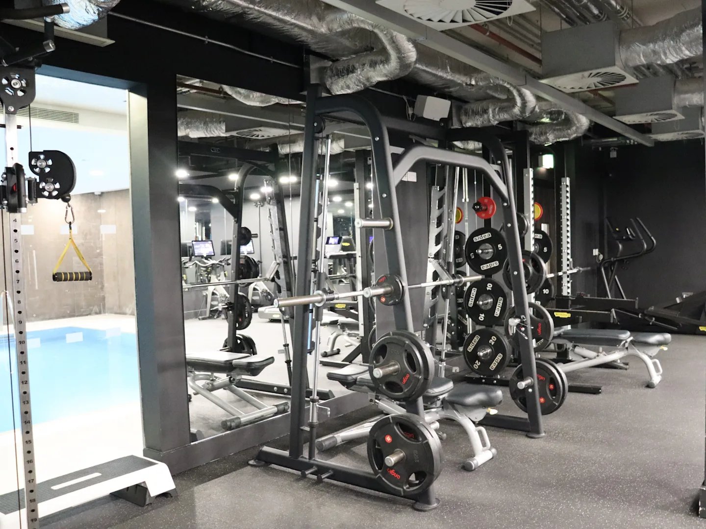 Weight racks exercise machines swimming pool Gym at Spring Mews in London Student Accommodation