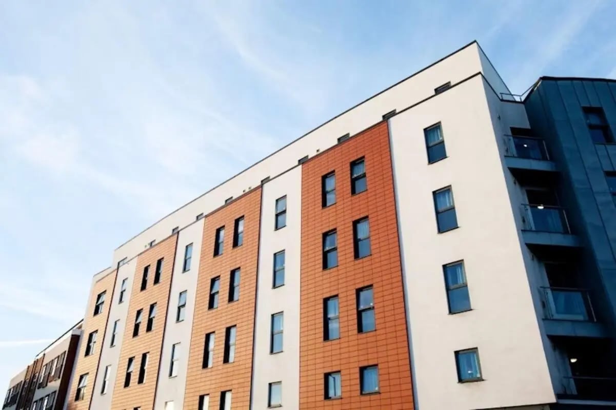 Modern building with orange and white panels exterior at Crown House - Reading in Reading Student Accommodation