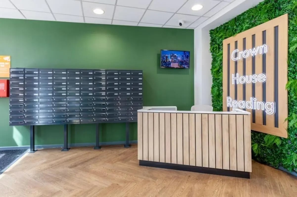 Mailboxes reception desk and vertical garden lobby at Crown House - Reading in Reading Student Accommodation