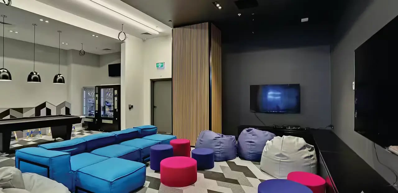Billiard table vending machines beanbags communal area at Scape Melbourne Central in Melbourne Student Accommodation