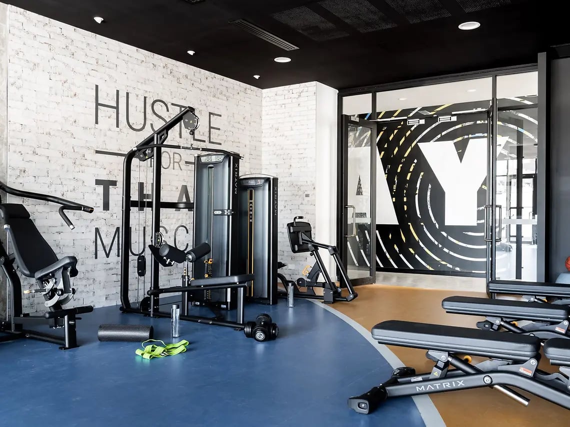 Weight machines exercise benches foam roller gym area at Yugo Perth City in Perth Student Accommodation