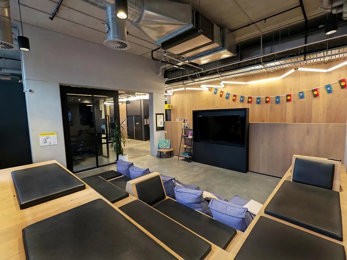 Tiered seating television and beanbags lounge at Yugo University Square Melbourne in Melbourne Student Accommodation