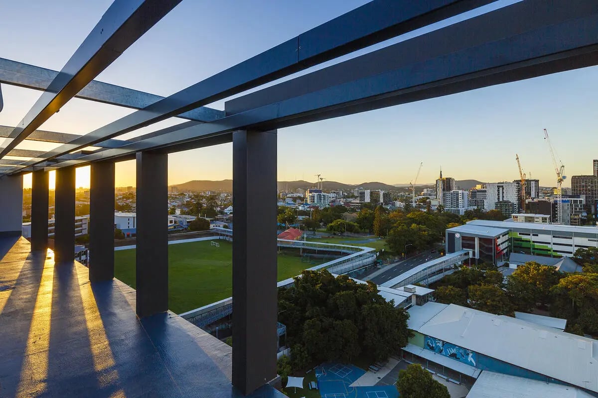 Balcony view of cityscape and sports field exterior at Scape Merivale in Brisbane Student Accommodation