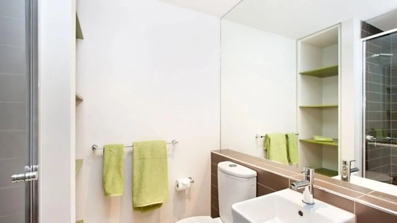 Toilet sink towels shelving shower bathroom at Student Living - Vivida in Melbourne Student Accommodation