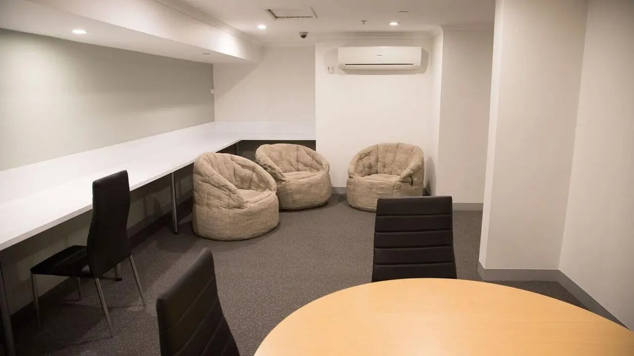 Beanbag chairs table and chairs communal area at Student Living on Flinders in Melbourne Student Accommodation