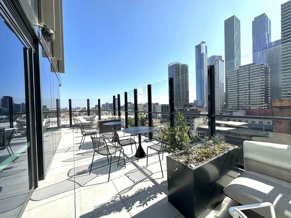 Outdoor seating with city view communal area exterior at The Switch Melbourne Victoria Market in Melbourne Student Accommodation