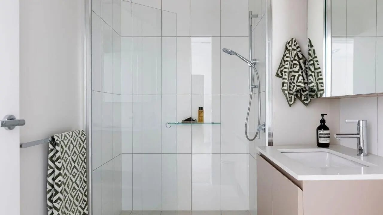 Shower vanity sink soap dispenser and towels bathroom at Realm Caulfield in Melbourne Student Accommodation