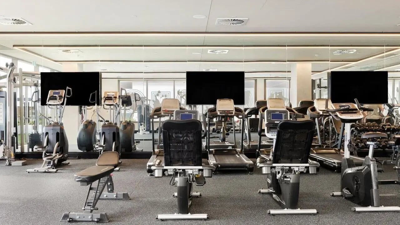 Gym equipment with treadmills and weight machines Gym at Realm Caulfield in Melbourne Student Accommodation
