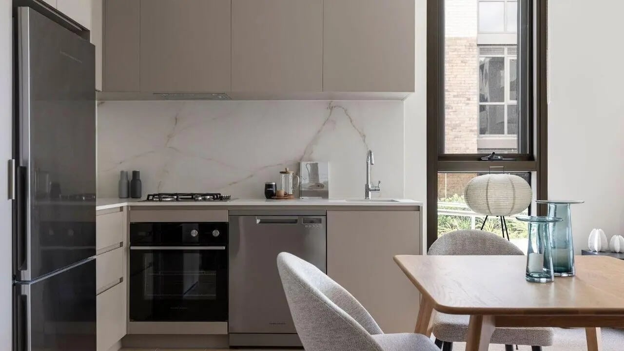 Fridge oven dishwasher modern kitchen setup kitchen at Realm Caulfield in Melbourne Student Accommodation