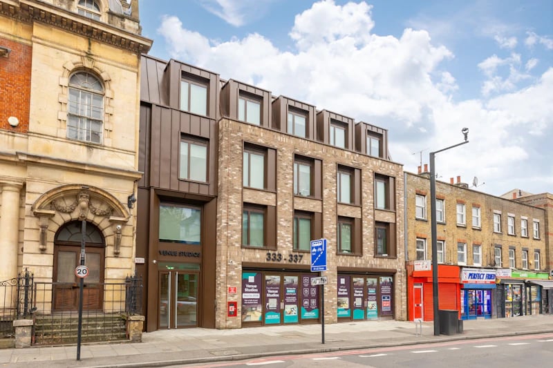 Modern brick building with multiple windows exterior at Venue Studios in London Student Accommodation