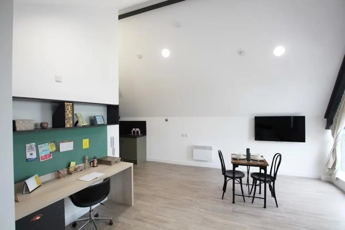 Desk chairs TV table and chairs studio apartment at Mannequin House in London Student Accommodation