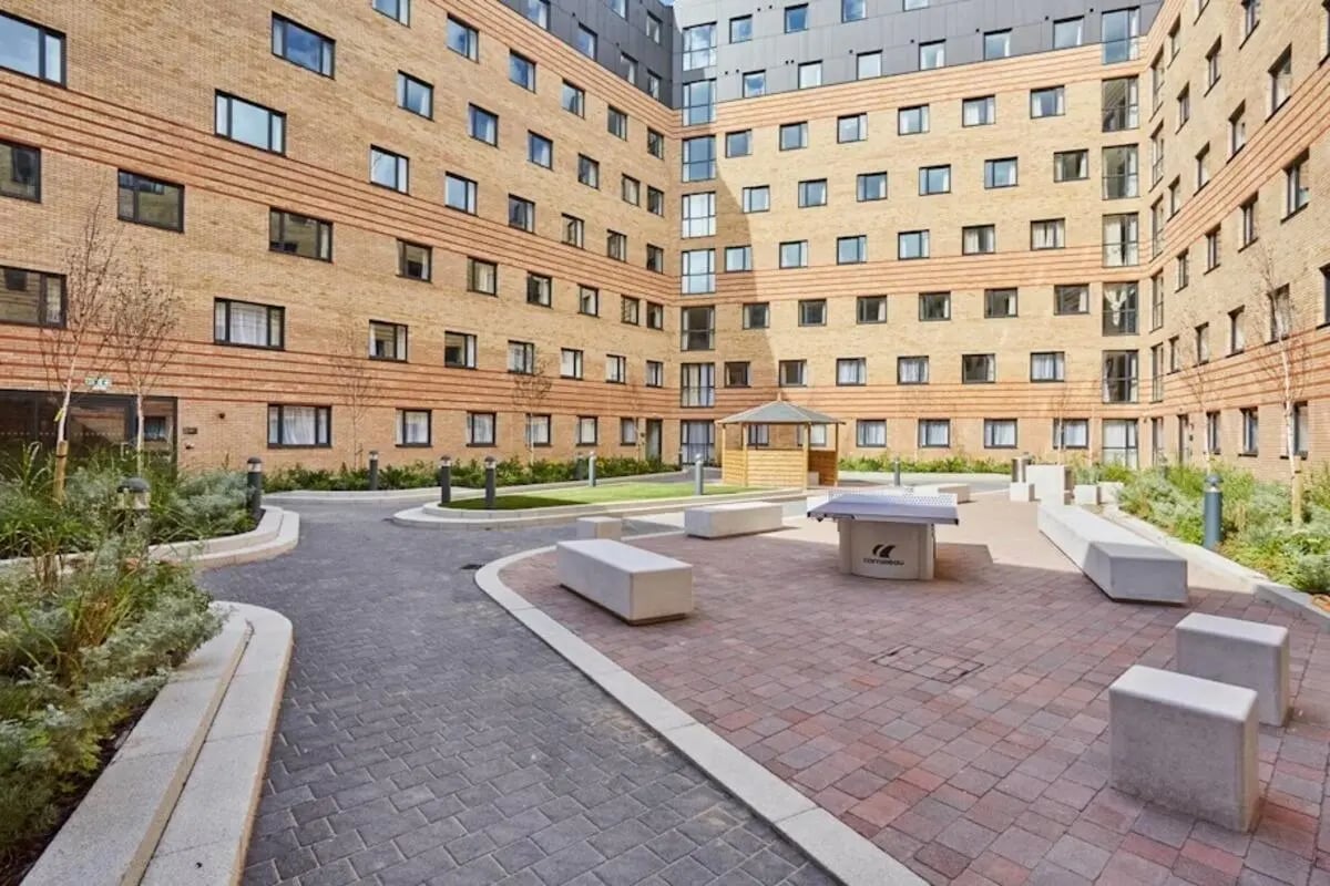 Ping pong table benches gazebo outdoor courtyard exterior at Mannequin House in London Student Accommodation