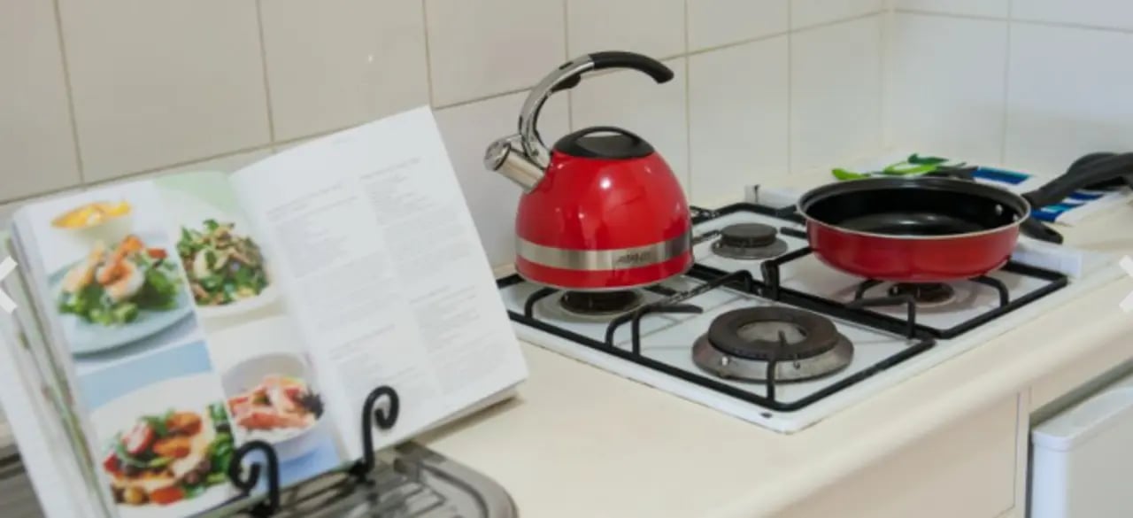 Red kettle cooking pan cookbook kitchen at Student Living-590 Lygon in Melbourne Student Accommodation