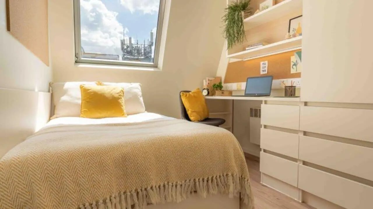 Bed desk chair storage laptop window bedroom at iQ The Arcade in London Student Accommodation