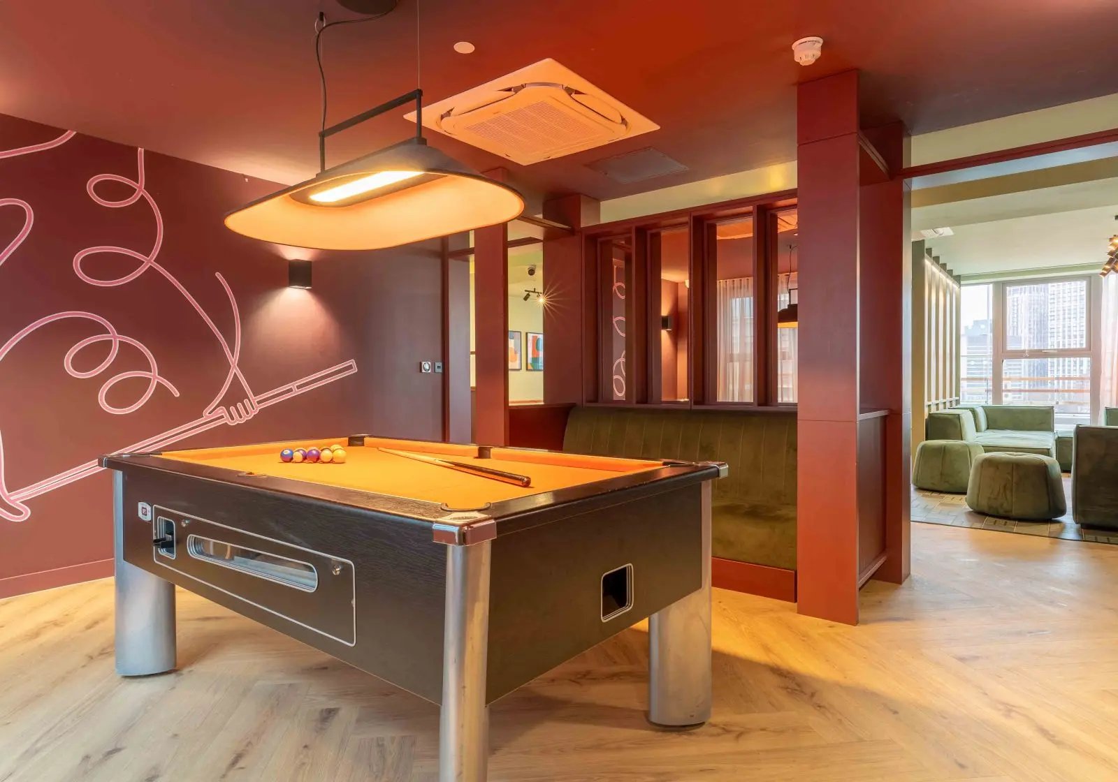 Pool table with balls and cues playing area at iQ Paris Gardens in London Student Accommodation